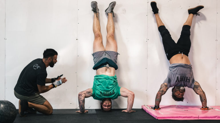 Image of a CrossFit athlete doing a Strict Handstand Push-Up